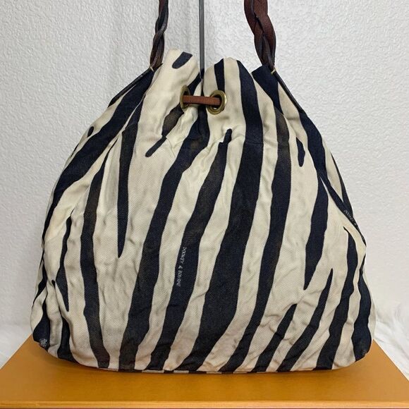 Dooney and Bourke Vintage Zebra Print Drawstring Bag - Picture 11 of 13